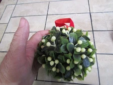 ugly plastic Christmas mistletoe ball with hanging ribbon 