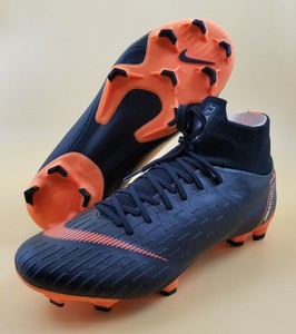 black and orange nike soccer cleats