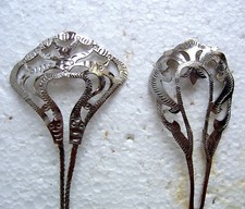 Two silver tone vintage hair pins with openwork design ABN NO US IMPORT FEE