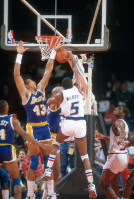 Mychal Thompson Los Angeles Lakers blocks the shot of Darr Basketball 1988 Photo