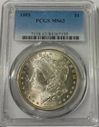 1885 USA MORGAN SILVER DOLLAR PCGS MS 63 light gold tone