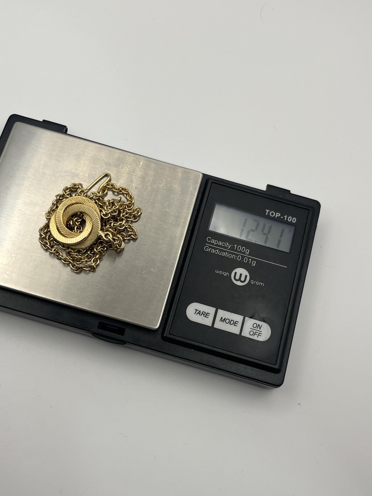 Engine turned gold tone triple interlocking circl… - image 15