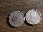 1921-S Silver Morgan Dollar and a 1958 $1 Canadian silver coin.