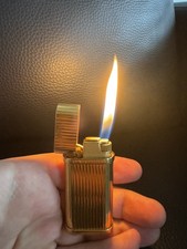 Cartier Oval vintage lighter Good Plated ( No Box ) with 3 packs Lighter Flints.