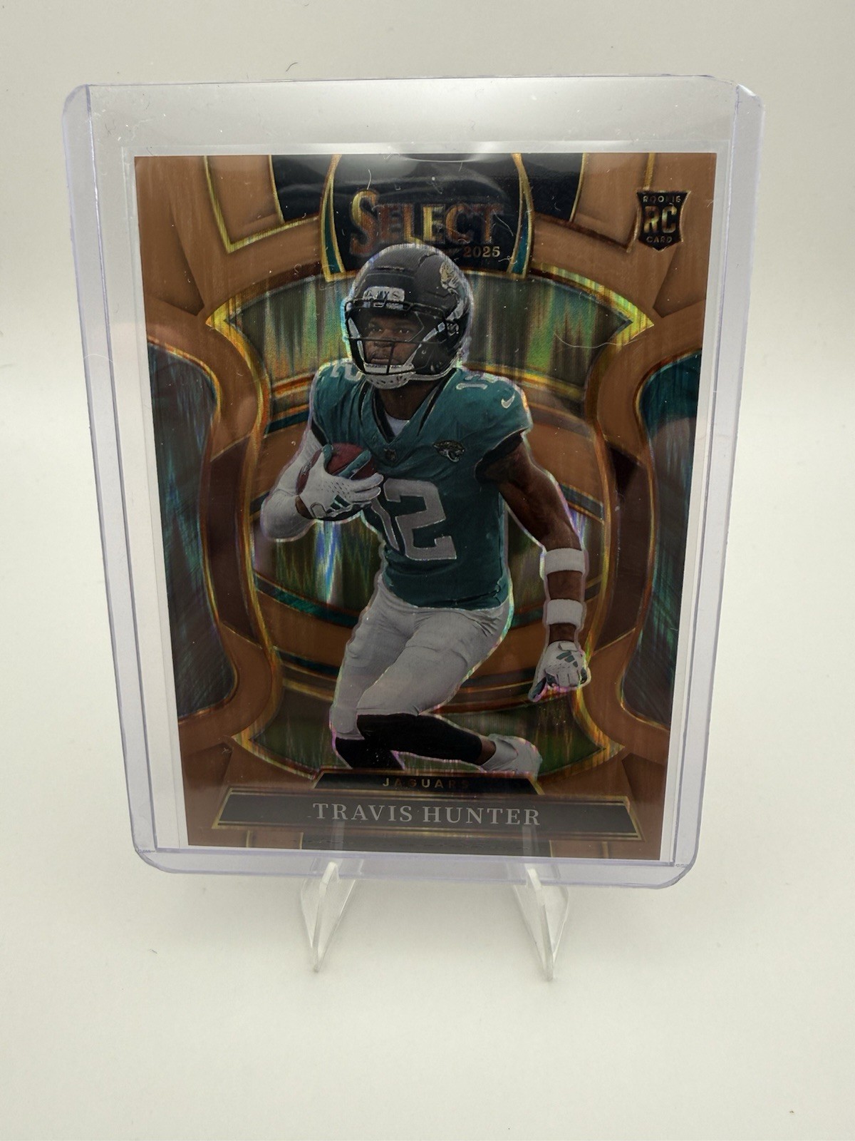 2025 Select Travis Hunter Premier Level Copper Prizm Shock (RC) /899 Jaguars