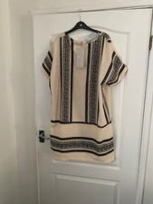 Beige and Black dress one size oversized with tag £25.99