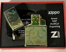 Zippo 46313, Deep Carved Armor, Cannabis Design with Single Torch Green Insert. 