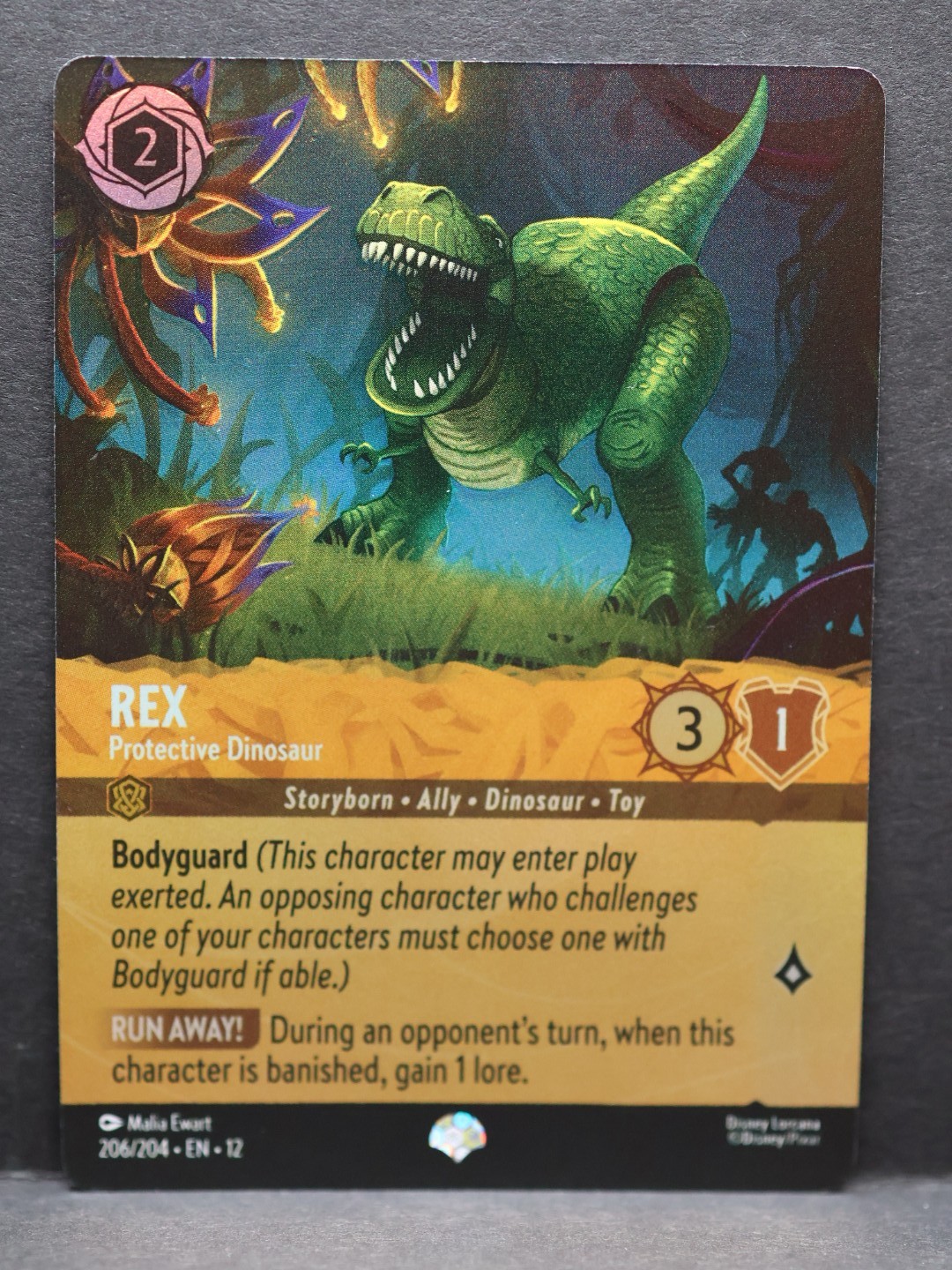 Disney Lorcana Wilds Unknown Rex Protective Dinosaur Epic Foil 206/204