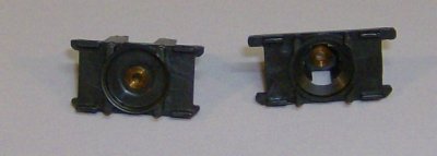 A PAIR ''NEW'' TYCO BULKHEADS WITH BUSHINGS FOR 440X2 OR MATTEL HPX2 HO SLOT CAR