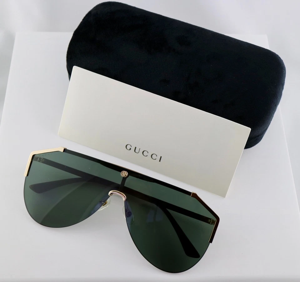 Gafas de sol Gucci GG0584S 002 Shield con lentes verdes brazos marrones
