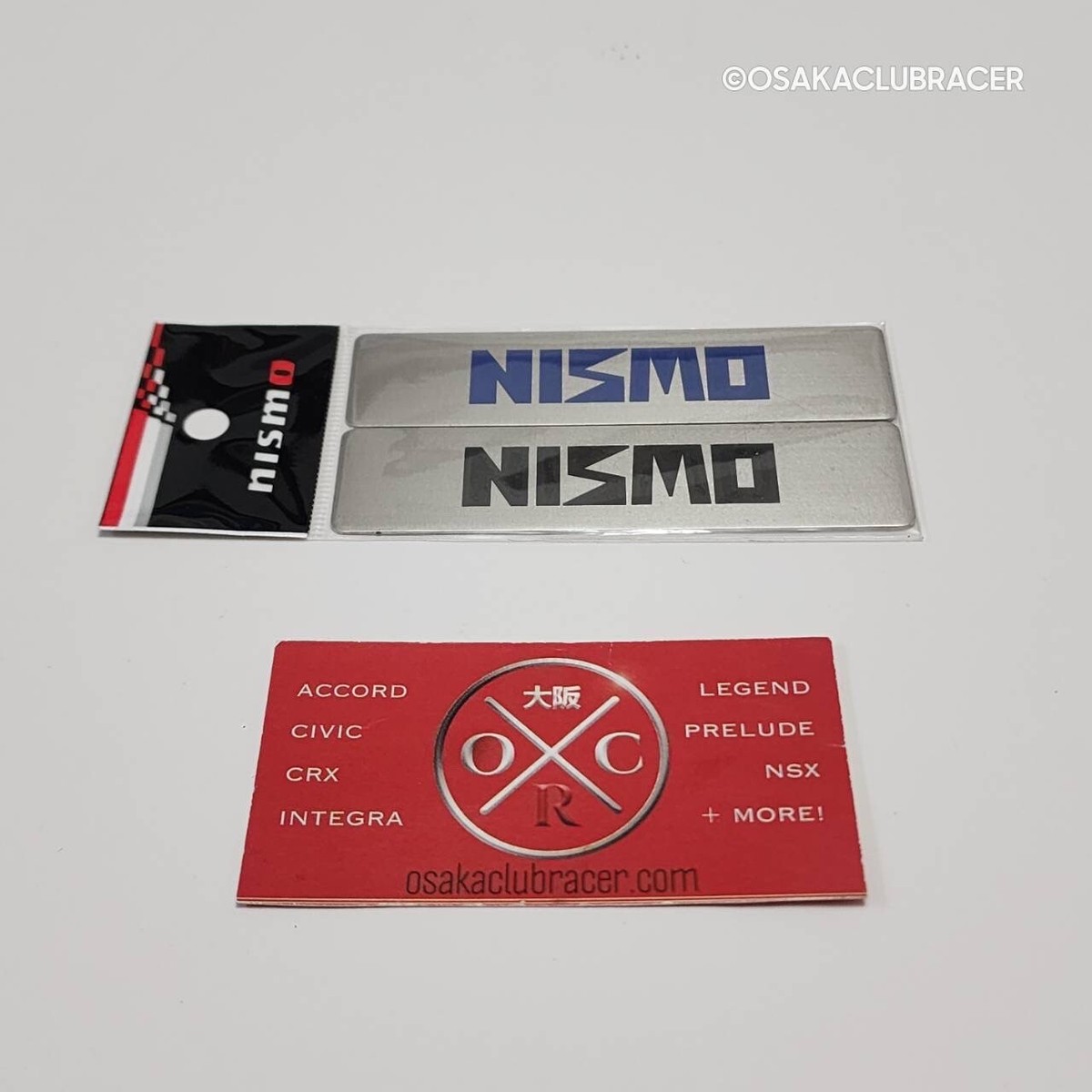 Genuine OEM NISMO Emblem Badge Set 2pc JDM Old Logo Silver 40th