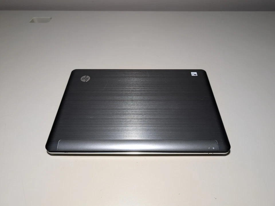 Windows 7 HP Pavilion dm3 | Athlon Neo X2 | 4GB RAM | 320GB HDD | Cargador HP Foto 3 de 4