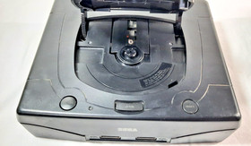 SEGA Saturn V2 Black Console Only Parts or repair. Powers on, Wont Read Disc.