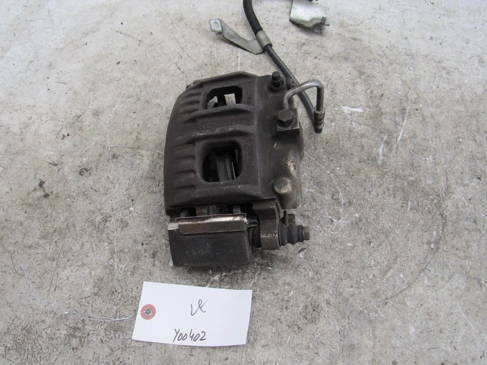 2000 Lincoln Navigator left driver side front wheel brake caliper OEM 4x2 Foto 2 de 4