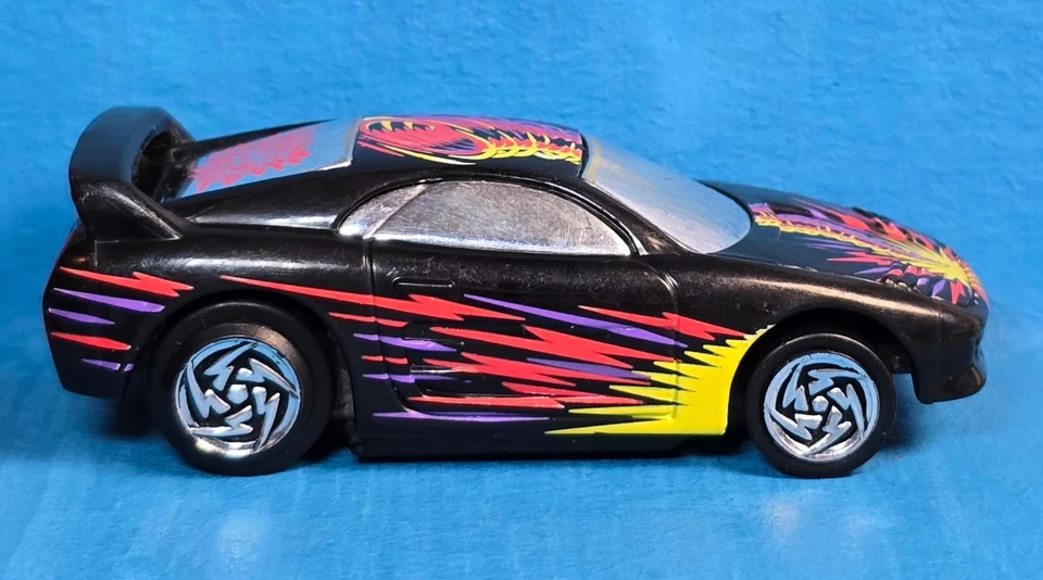 Ranura eléctrica Hot Wheels negra con Tornado Tampo - Coche Toyota de carreras 1996 01 Foto 2 de 4