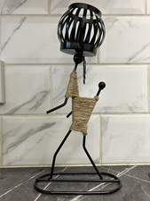 Retro Western iron man restaurant candleholder. Candle on head.