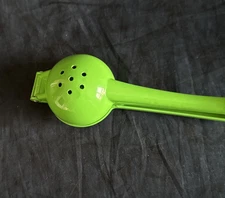 Metal Citrus squeezer, the Best! Metal makes for light work.