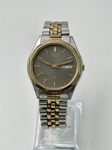 Montre Citizen CQ Quartz 6100-K02759 en acier inoxydable, date jour pile neuve, fonctionne