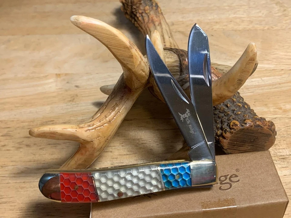 Navaja de bolsillo Elk Ridge roja, blanca y azul C-Tek Trapper 3 1/2" ER946 Foto 2 de 4