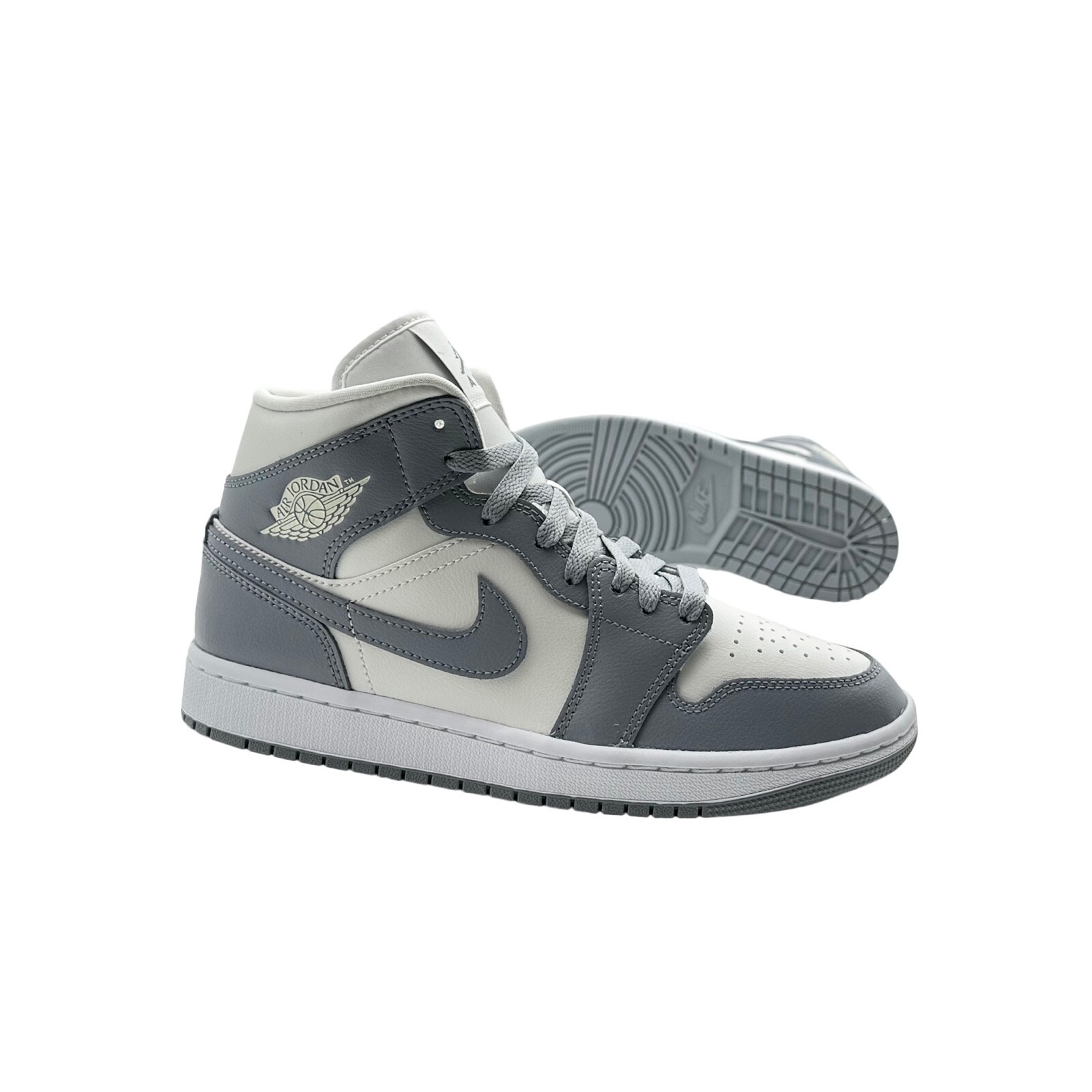 Купить Nike Wmns Air Jordan 1 Mid Stealth Grey на Аукцион DE из Германии с  доставкой в Россию, Украину, Казахстан
