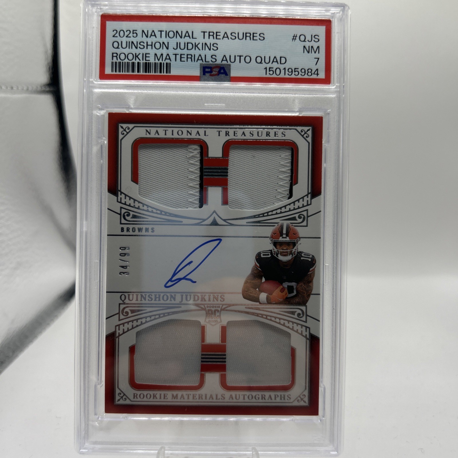 Quinshon Judkins Panini National Treasures Rookie Materials Autographs Quad #QJS Brand Logo Laundry Tag 1/1