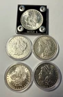 (5) Five Morgan U.S. SILVER DOLLARS: 1885-O( 2) Both Gem, 1889-P, 1896-P, 1903-P