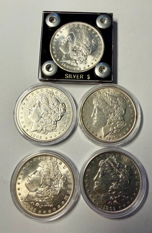 (5) Five Morgan U.S. SILVER DOLLARS: 1885-O( 2) Both Gem, 1889-P, 1896-P, 1903-P