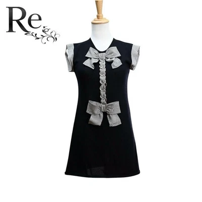 Robe en tricot CHANEL taille 38 ruban rayé noir et blanc excellent état - Photo 1/4