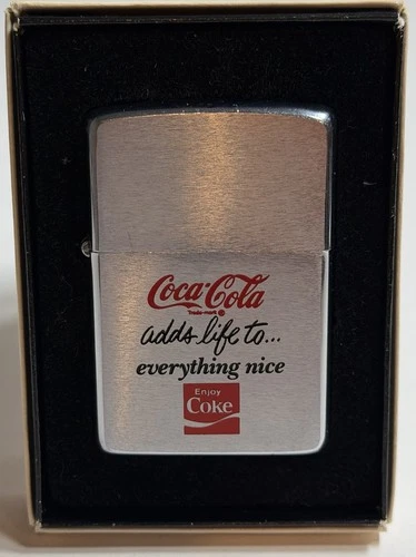 Vintage 1981  Zippo - Coca-Cola -  Slogan: adds life to every nice - In Box