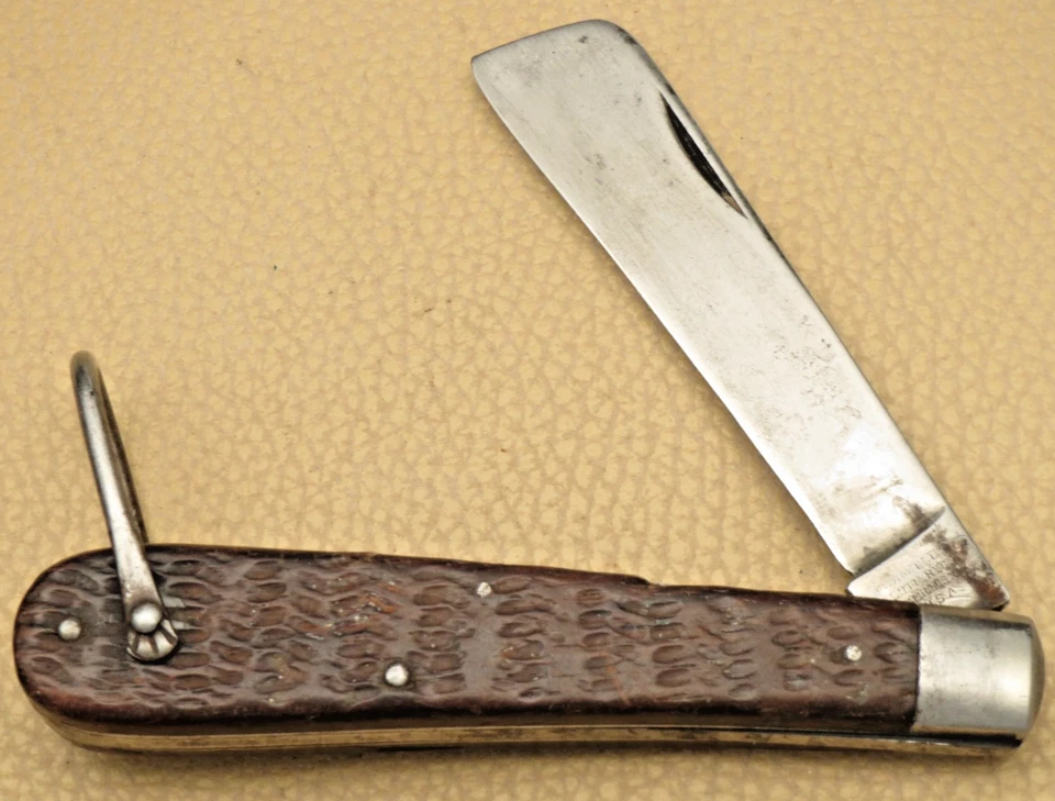 Antiguo sello de 4 líneas de cubiertos Camillus - Cuchillo de cuerda de una sola hoja de la Segunda Guerra Mundial - USCG Foto 2 de 4