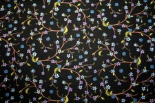 SEW DE VINE - FLOWERING VINES IN BLUE AND PURPLE ON BLACK - 100% COTTON FABRIC