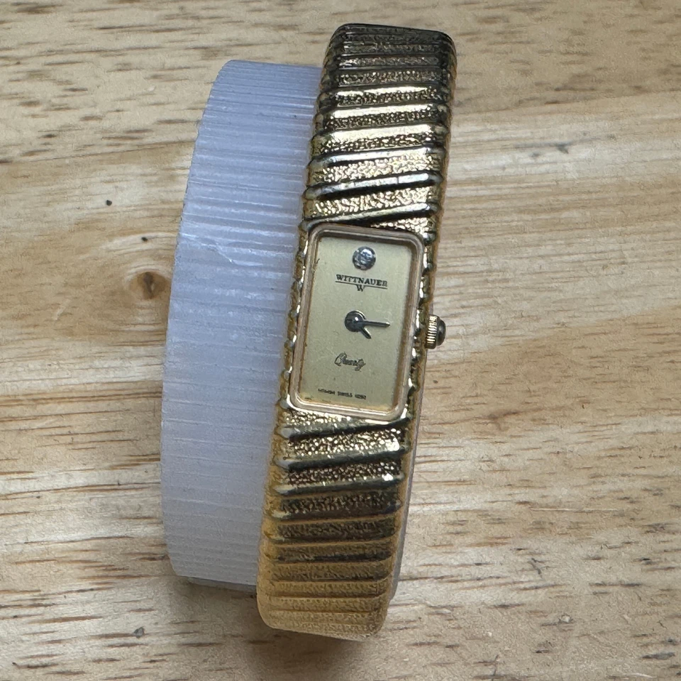 Bonito reloj de cuarzo suizo Wittnauer HT4494 para mujer tono dorado brazalete batería nueva Foto 2 de 4