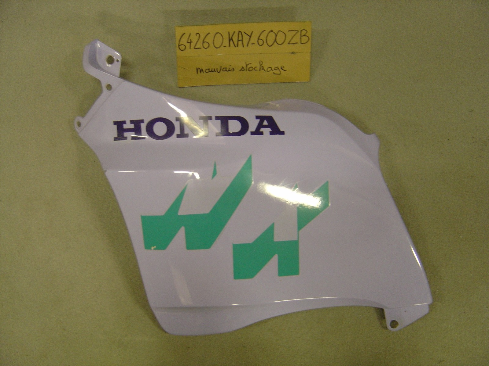 Flanc de carénage gauche pour moto Honda NX 125 1989 d'origine neuf