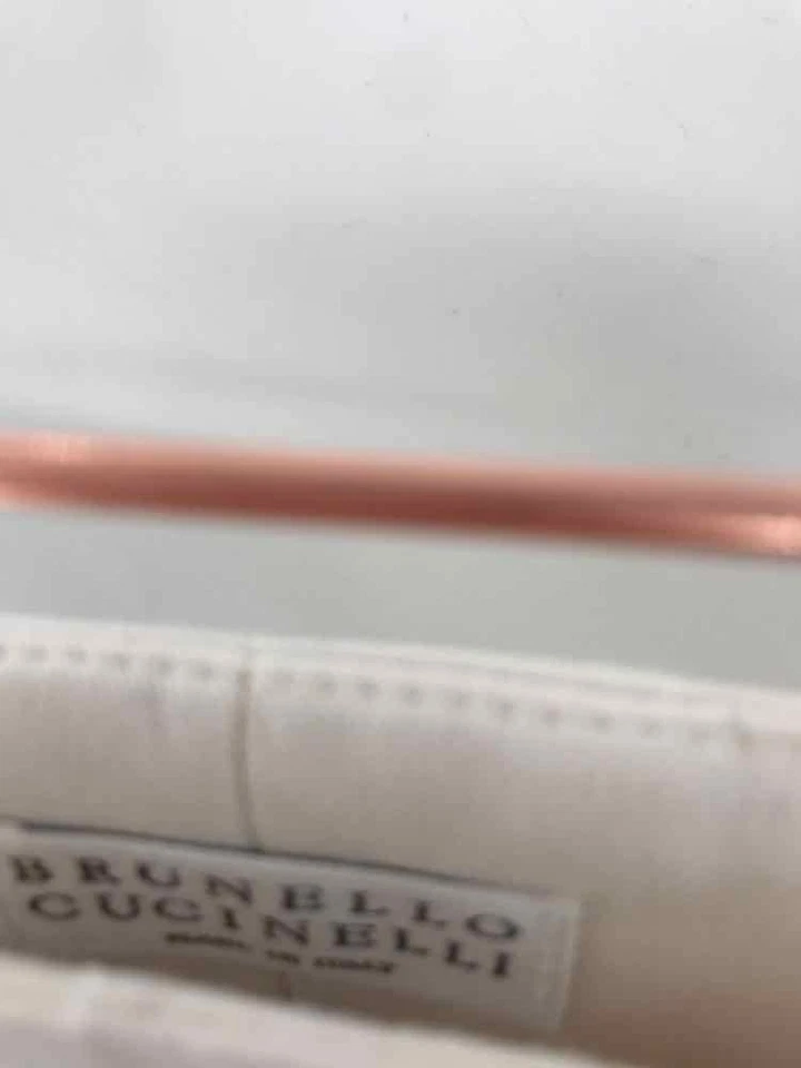 Pantalones de vestir Brunello Cucinelli marfil talla 10 usados Foto 3 de 3