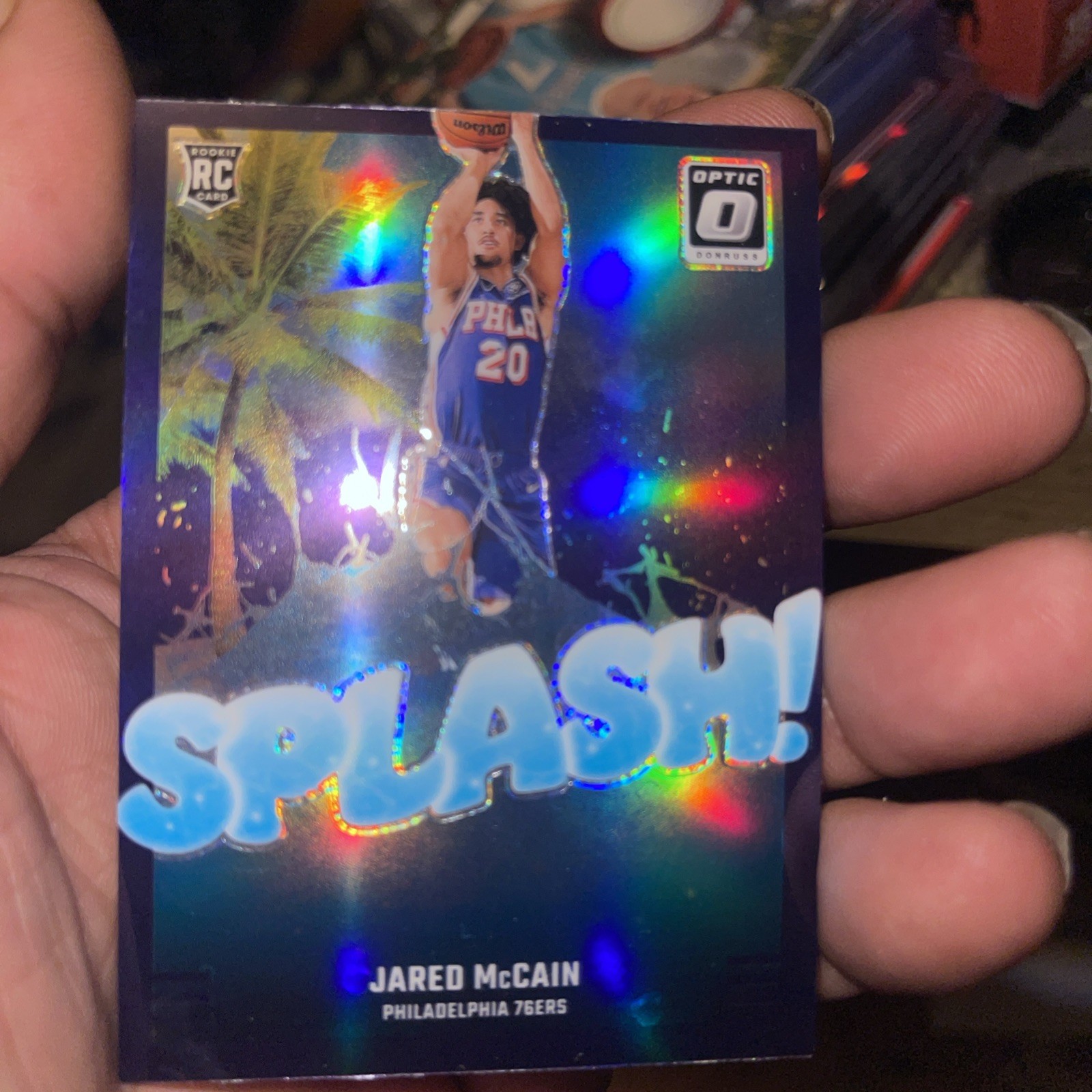 2024-25 Panini Donruss Optic - Purple Holo Splash! Jared McCain #3 (RC)