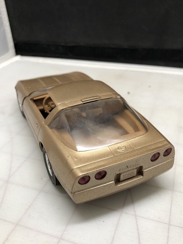 AMT ERTL 1984 CORVETTE COCHE PROMOCIONAL - ESCALA 1 25 - DORADO CON INTERIOR MARRÓN A14 - Imagen 4 de 13