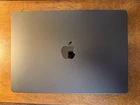 2025 14-inch MacBook Pro in Space Black, M5 chip, 32GB memory, and 1TB