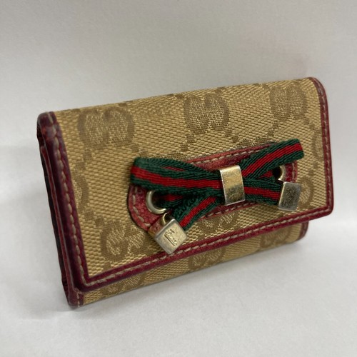 Auténtico estuche para llaves Gucci GG lona beige cinta cuero rojo - Imagen 2 de 18