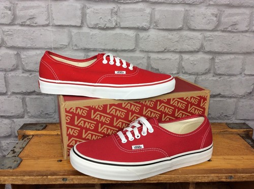 orange checkered slip on vans