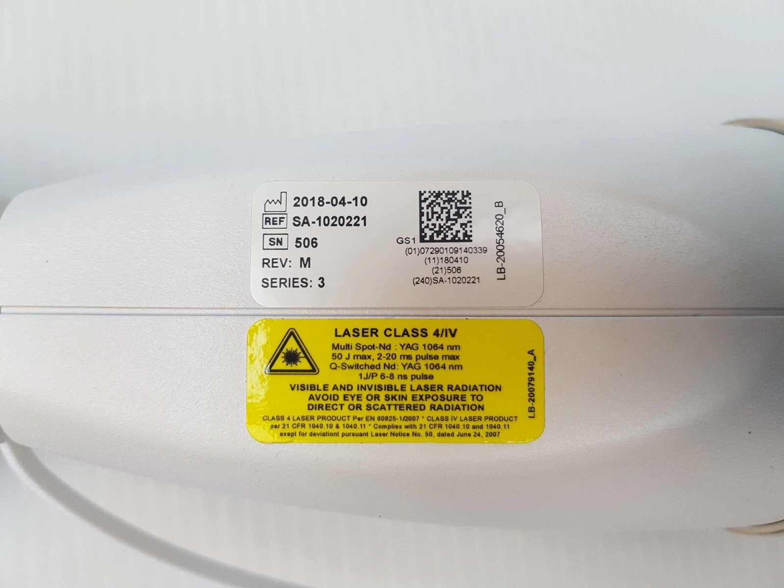 SA-1020221 Rev M label and yellow Class 4 laser label, 1064 nm