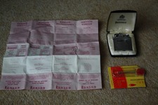 Ronson pocket lighter made in England flints instruction booklet needs servicing