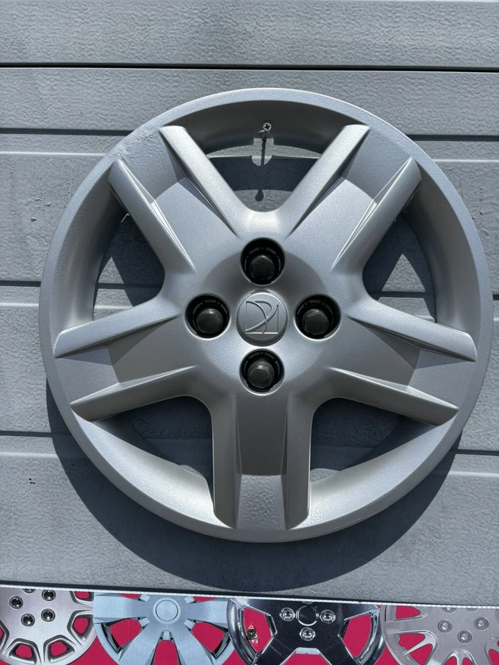 2005-2007 Saturn Ion 15” OEM Hubcap 4 Lug Bolt On Fits Steel Wheel Used  One Oem - Image 2 of 4