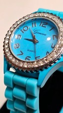 Geneva Quartz Blue Dial Blue Rubber Strap Gem-Set Bezel Watch