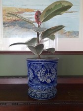 A German salt glazed stoneware jardinaire and stand.