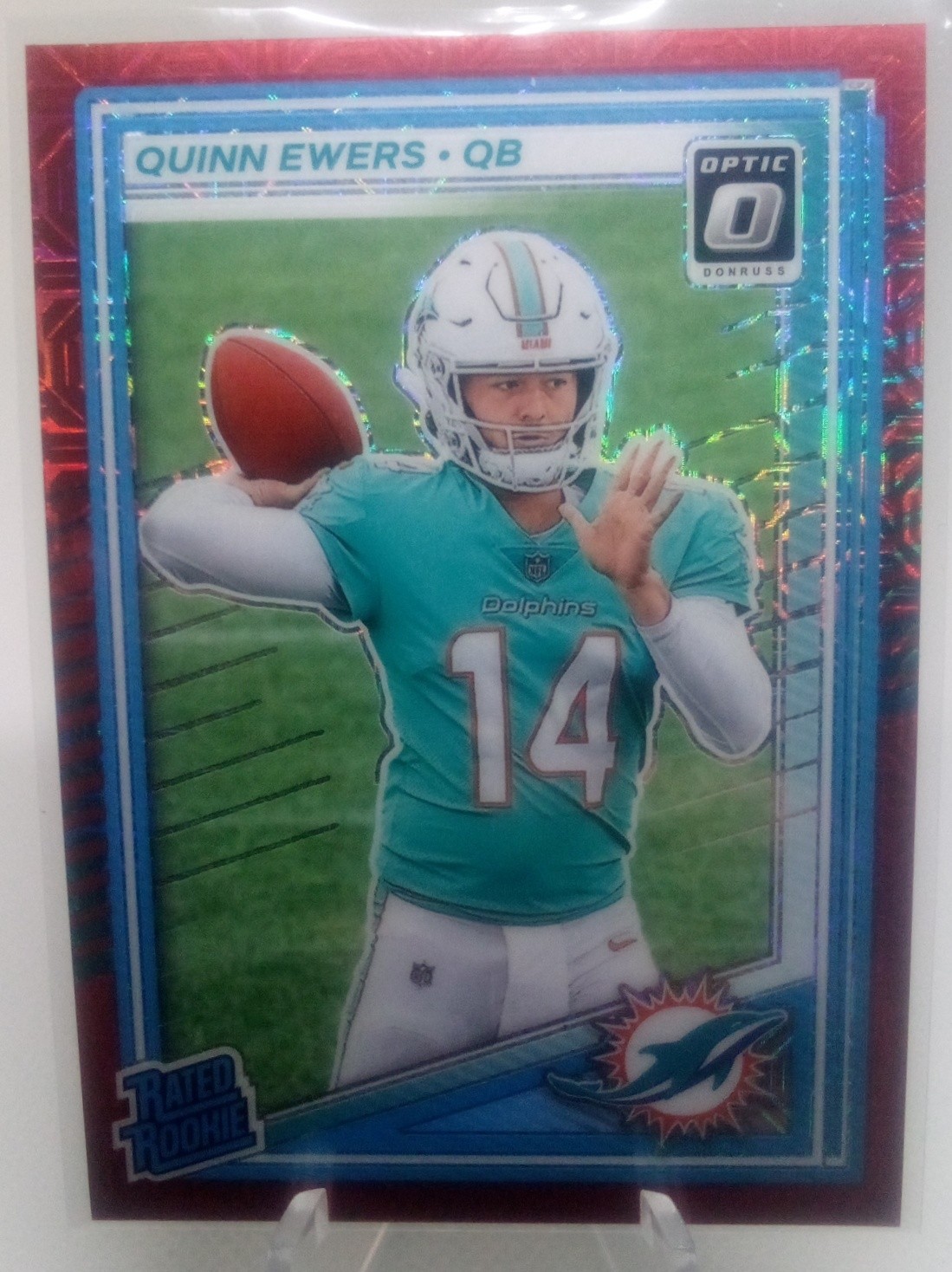 2025 Panini Donruss Optic Quinn Ewers #213 Rated Rookie Red Mojo Prizm Dolphins
