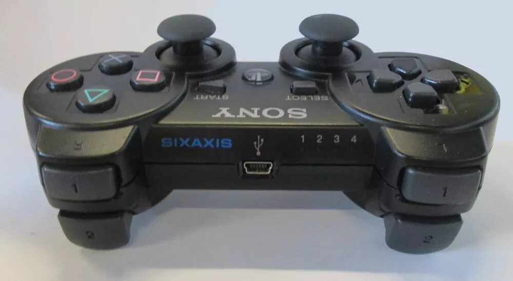 Проверить джойстик на пк. Dualshock 3. Sixaxis Controller ps3. Dualshock 3 Sixaxis кнопка reset. Геймпад logic3 ps2 Freebird Wireless Gamepad.