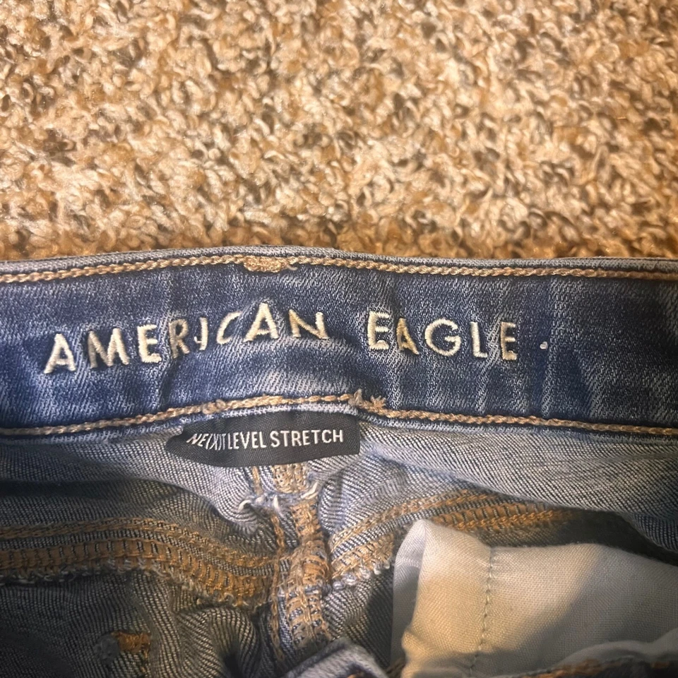 Pantalones de mezclilla American Eagle Jeggings Next Level elásticos lavado oscuro 00 largos Foto 2 de 4