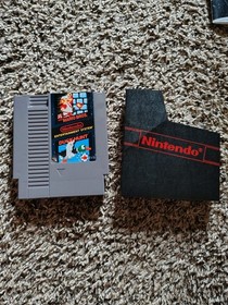 Juego de acci&oacute;n NES en caja sistema de entretenimiento Nintendo con Zapper y Super Mario Bros