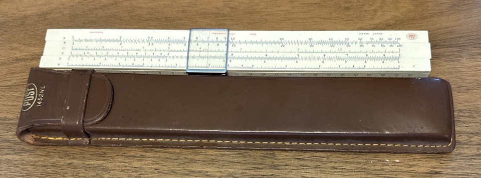 A pre-digital engineer's best friend — this Japanese Sun Hemmi slide rule is a beautifully crafted bamboo-core relic from the golden age of analog computing.
