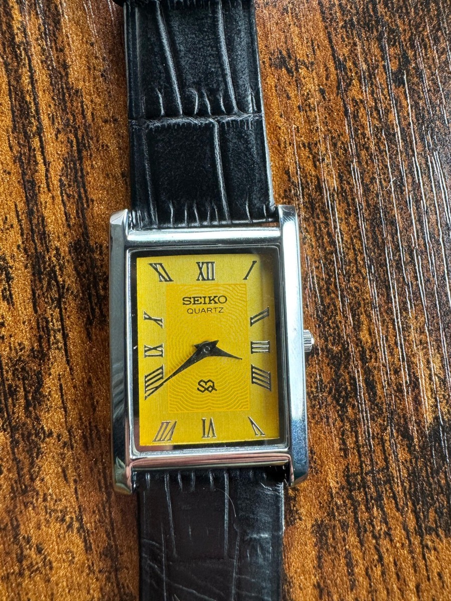 読*き様 SEIKO tank ヴィンテージ　美品 　クオーツ　レクタンギュラー vintage Seiko Slim Tank Quartz Men Yellow Dial Black leather Dress